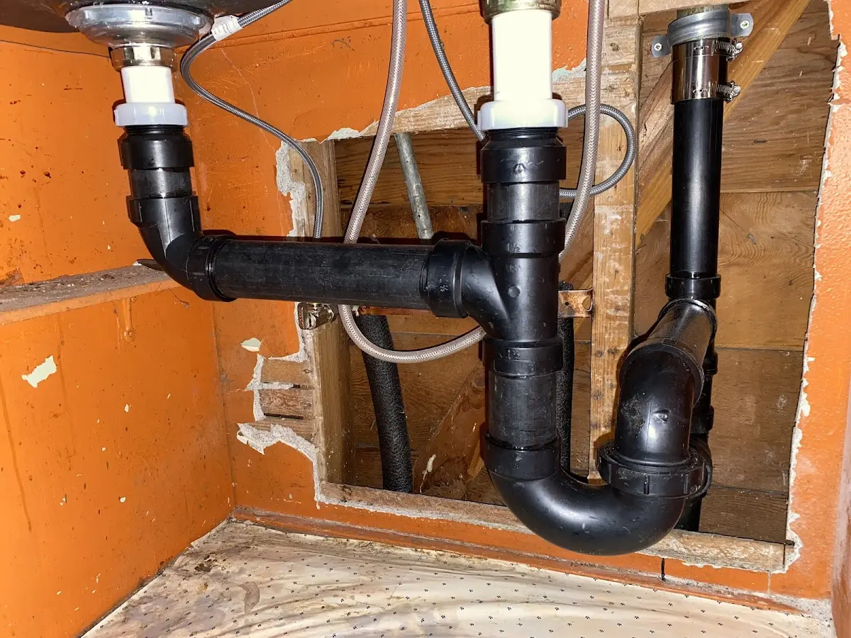 Professional Garbage Disposal Repair equipment and tools on the job in South Harrison
